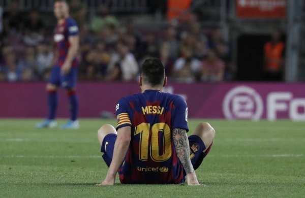 Messi, tras su lesión en el Barça-Villarreal. 