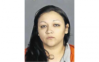 Mujer arrestada llevaba arma dentro de la vagina