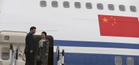 Xi Jinping y su esposa Peng Liyuan, tras una visita oficial a Reino Unido