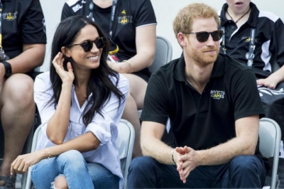 Meghan Markle junto al Príncipe Harry.
