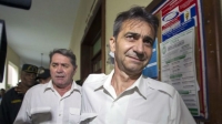 Pascal Fauret (izda.) y Bruno Odos abandonan el tribunal en Santo Domingo después de una audiencia el 8 de mayo de 2014.