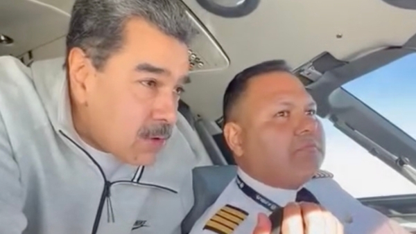El presidente de Venezuela, Nicolás Maduro, y el piloto presidencial, Bitner Villegas.