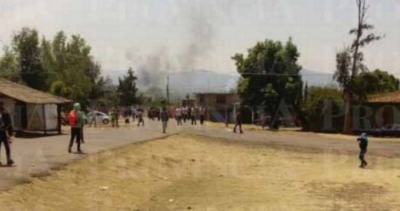 Alrededor de las 12:00 se registro el enfrentamiento en la carretera el Grupo Antimotines y los normalistas
