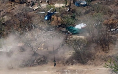 Autoridades hallaron más de 50 bolsas con restos humanos en una barranca de la colonia Mirador Escondido y Fiscalía informa que corresponden a jóvenes desaparecidos. EL INFORMADOR/ A. Camacho