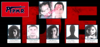 La española Isabel Mazarro, detenida por la Guardia Civil, aparece en el centro la parte inferior de la imagen.