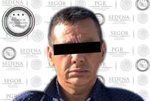 El jefe de la Agencia de Investigación Criminal (centro) detalló que junto a José Guadalupe fue detenido otro sujeto. 