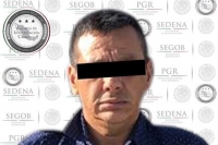 El jefe de la Agencia de Investigación Criminal (centro) detalló que junto a José Guadalupe fue detenido otro sujeto.