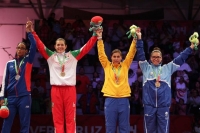(De izquierda a derecha) La cubana Glenhis Hernández (plata), la mexicana María del Rosario Espinosa (oro), la colombiana Sandra Venegas y la hondureña Joselin Molina (bronce) celebran en el podio de la categoría de 73 kg. en taekwondo hoy, lunes 17 de noviembre de 2014, en el marco de los Juegos Centroamericanos y del Caribe Veracruz 2014, en el puerto mexicano de Veracruz.