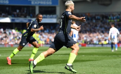 Agüero celebra el primer gol del City. Michael Regan