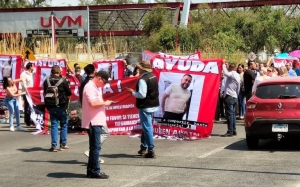 Amigos del Secretario del Juzgado Tercero de Distrito de Amparo en Materia Penal cerraron el Periférico; exigen su localización