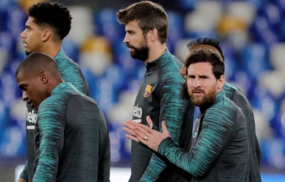 Messi y Piqué, en el estadio San Paolo. 