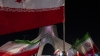 Ondeo de banderas iraníes ante el monumento de Azadi (Libertad) al oeste de Teherán, 29 de abril de 2026